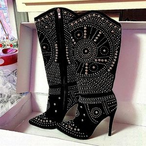 Knee high BLING high heeled boots. Walked in 4 times.